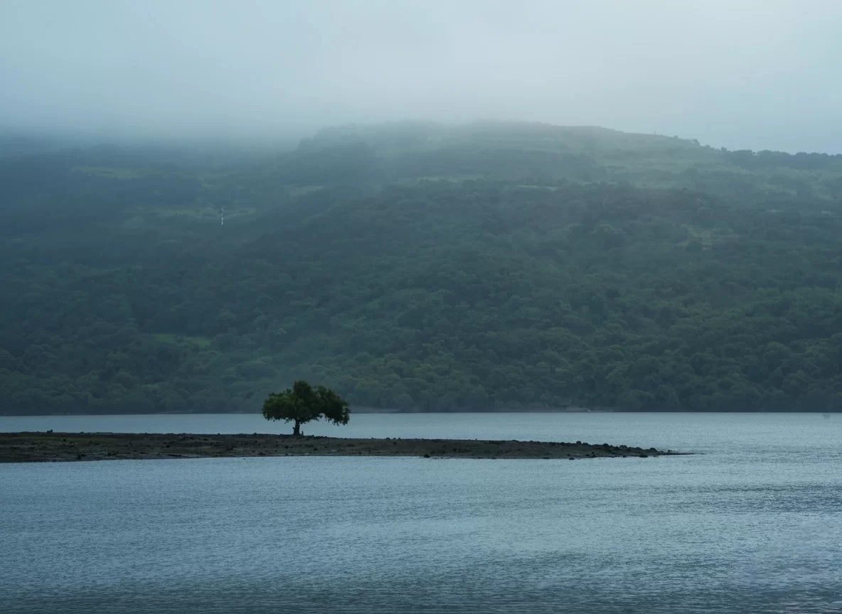 Valvan Lake View Point serene lake and Sahyadri hills panorama in Lonavala Maharashtra tour packages