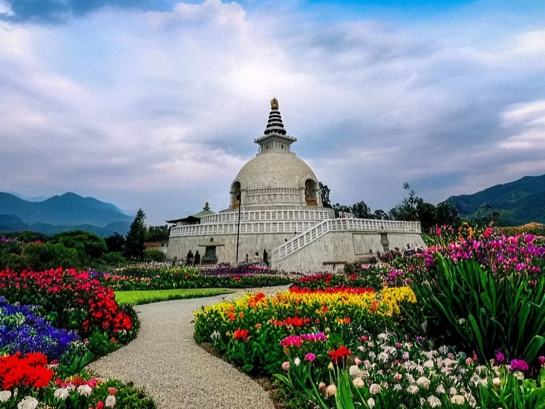 Vishwa Shanti Stupa Rajgir white peace pagoda with colorful gardens Buddhist pilgrimage site Bihar