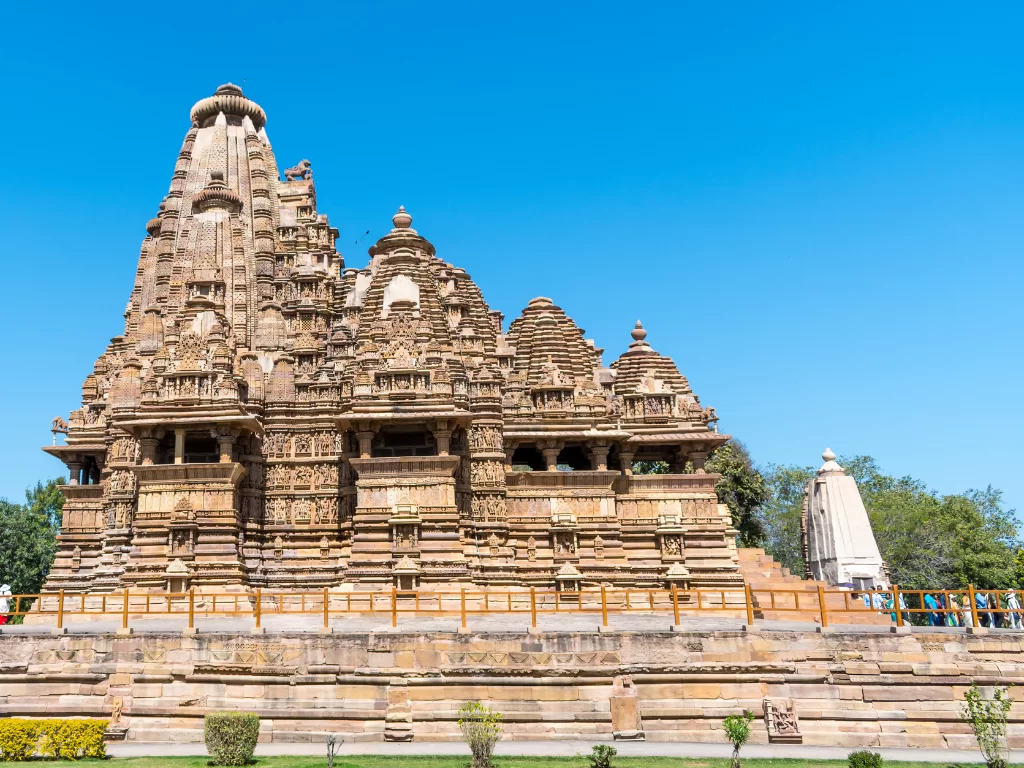 Vishwanath Temple Khajuraho Madhya Pradesh UNESCO heritage site, Nagara shikhara intricate carvings dedicated Lord Shiva with Nandi, perfect Chandela dynasty temple tour package.