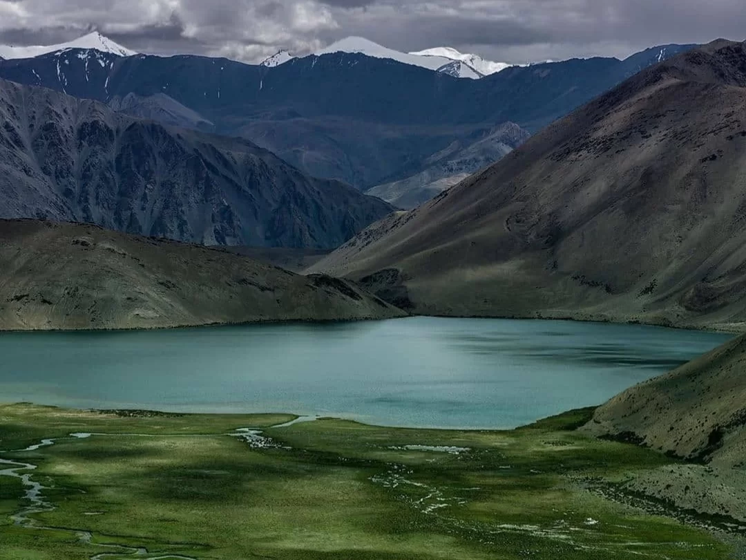 Yaye Tso Lake, pristine high altitude lake in Ladakh surrounded by rugged Himalayan mountains.
