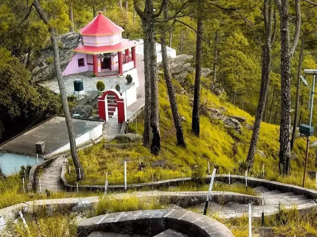 Kasar Devi Temple in Almora, Uttarakhand perched on a hillside amid pine forests, a serene spiritual spot featured in Uttarakhand tour packages
