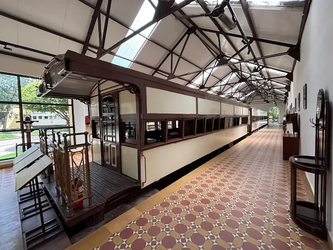 Railway Museum Mysuru. Vintage royal train coach exhibit inside historic rail museum in Mysore, Karnataka.