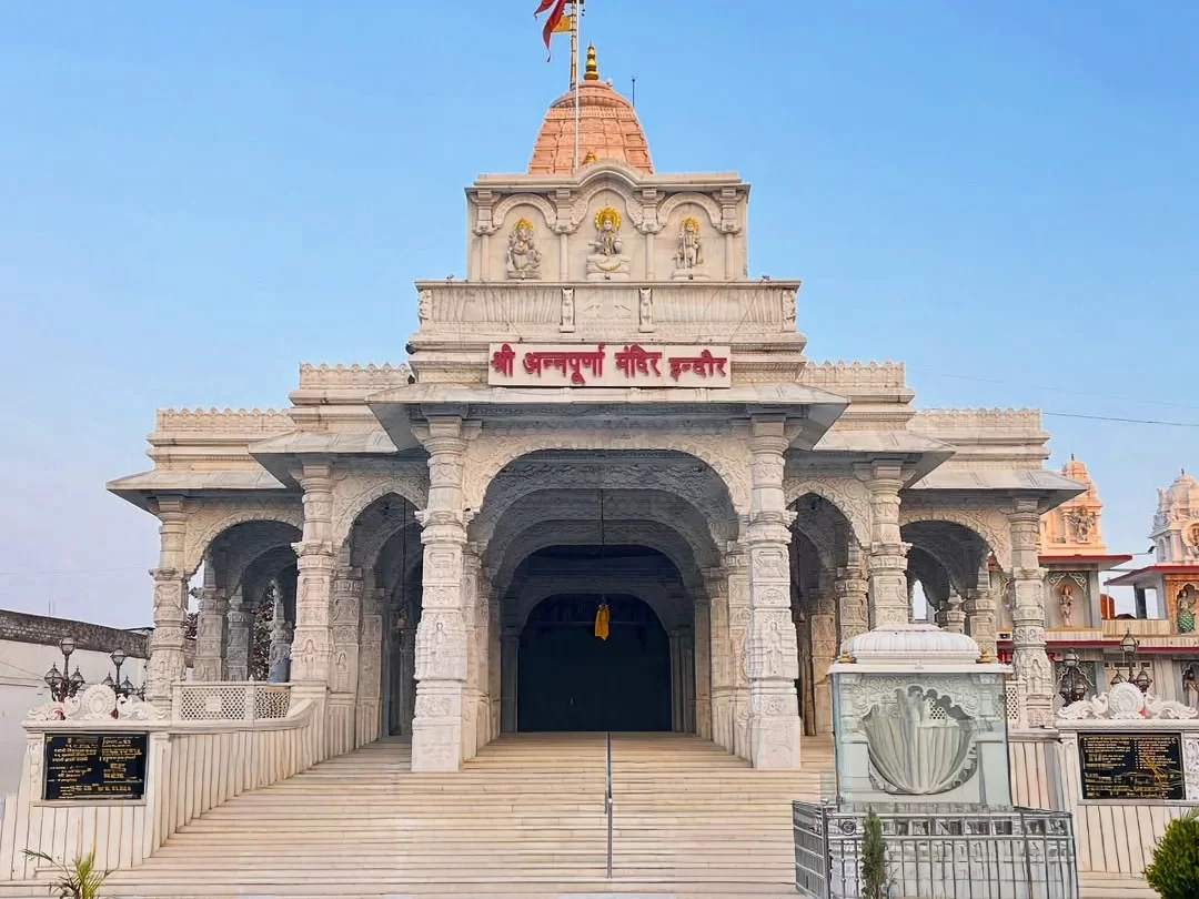 Shri Annapurna Temple in Indore, Madhya Pradesh, featuring ornate white marble architecture and grand entrance steps – a popular spiritual stop included in Madhya Pradesh tour packages.