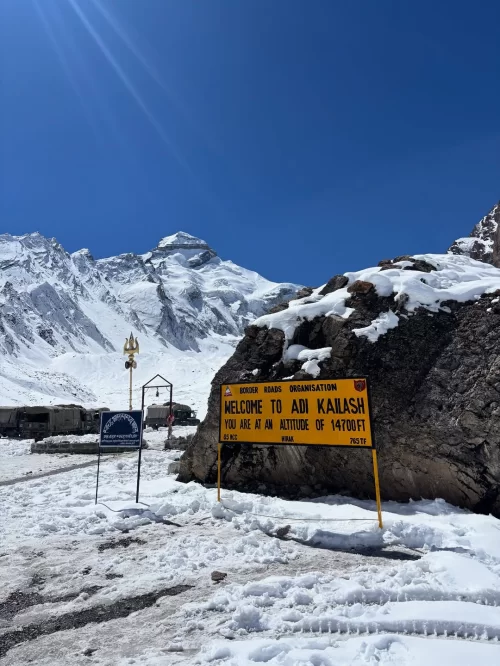 Adi Kailash Uttarakhand India snow covered Himalayan peak welcome sign Border Roads Organization altitude 14700 ft temple gate sacred landscape Uttarakhand tour package