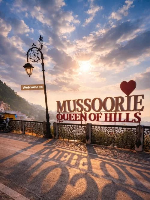 Mussoorie Queen of Hills viewpoint Uttarakhand at sunset, featuring mountain views and heritage railing, perfect hill escape Uttarakhand tour package