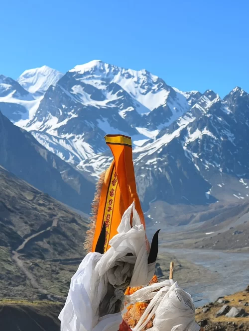 Om Parvat Uttarakhand India sacred mountain snow covered peak prayer flag valley landscape high altitude pilgrimage scenic view Uttarakhand tour package