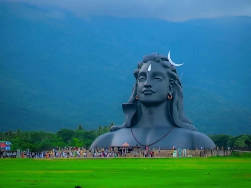 Adiyogi Shiva Statue, iconic 112-foot black bust of Lord Shiva at Isha Yoga Center, Coimbatore with scenic hills backdrop