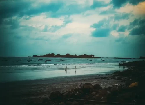 Alibaug Beach scenic Arabian Sea shoreline with Kolaba Fort view in Maharashtra tour packages