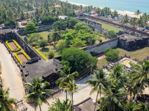 Anjuthengu Fort in Kerala, historic coastal fort near Arabian Sea with palm trees and scenic beach views.