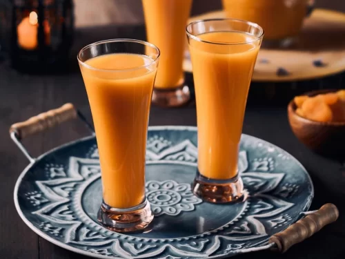 Apricot juice, refreshing sweet-tangy fruit drink made from ripe apricots, vibrant Indian beverage served chilled and nourishing.