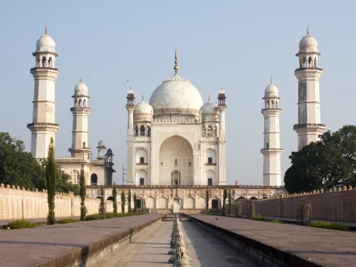 Bibi Ka Maqbara mausoleum Aurangabad during clear day, featuring white domes minarets gardens reflecting pool, perfect Maharashtra heritage tour package.