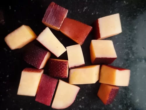 Chhurpi in firm fermented cheese cubes with natural rind, authentic Indian Himalayan dairy snack, traditional Indian cuisine delight.