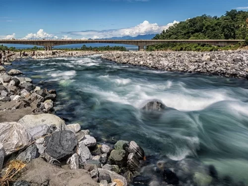 Deopani River crystal clear mountain river flowing through rocky landscapes and lush greenery in Arunachal Pradesh Package.
