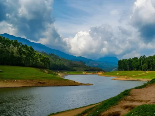 Echo Point Munnar in Kerala, scenic lake surrounded by lush hills and misty Western Ghats landscape.