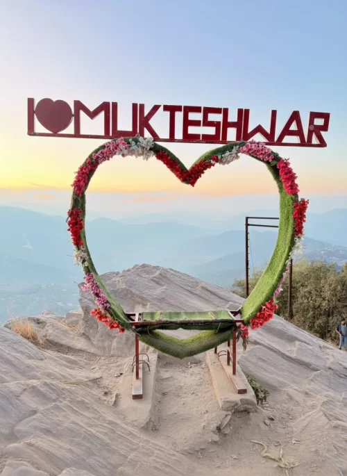 I Love Mukteshwar viewpoint with Himalayan sunset backdrop featured in Uttarakhand tour packages