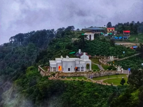 George Everest House in Mussoorie, Uttarakhand perched on a scenic hilltop overlooking lush valleys, a historic colonial landmark featured in Uttarakhand tour packages