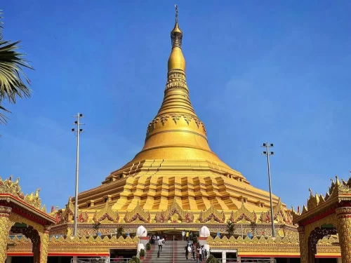 Global Vipassana Pagoda. Golden Buddhist meditation dome in Mumbai showcasing traditional Burmese architecture.