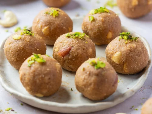 Camel safari at Jaisalmer during sunset, featuring sand dunes, perfect adventure Rajasthan tour package.