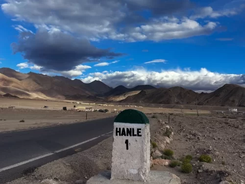 Hanle Ladakh highway milestone 1 dramatic clouds barren mountains, Indus valley peaks blue sky highway adventure, perfect Hanle Indian Astronomical Observatory gateway package. 