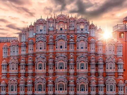 Hawa Mahal iconic pink sandstone Palace of Winds with 953 honeycombed windows and intricate latticework in the heart of Jaipur Rajasthan.