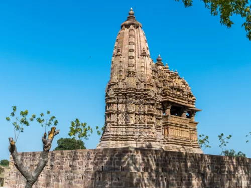 Javari Temple Khajuraho Eastern Group UNESCO site, Nagara-style Vishnu shrine with makara torana arch slender shikhara intricate carvings, ideal Madhya Pradesh Chandela heritage tour package.