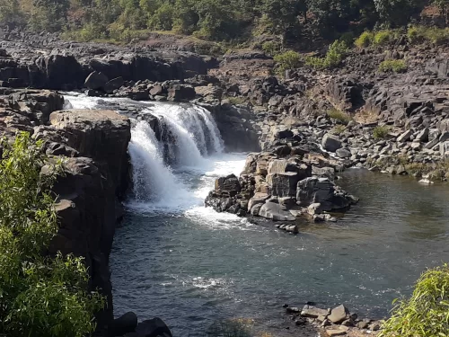 Johila Waterfall near Amarkantak with rocky cliffs and cascading river views, Madhya Pradesh nature tourism attraction
