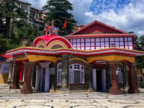 Kali Bari Temple Shimla during partly cloudy weather, featuring colorful domes pillars, deodar trees hills backdrop, perfect spiritual heritage, Himachal Pradesh tour packages.