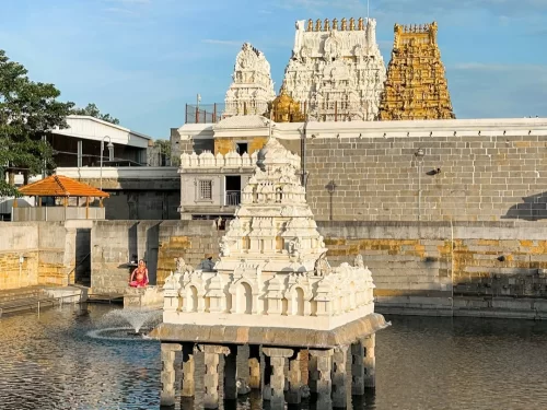 Kamakshi Amman Temple, sacred Shakti temple in Kanchipuram with golden gopuram and temple tank pavilion view