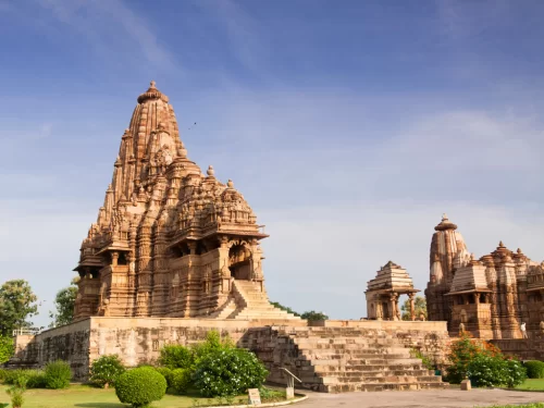 Kandariya Mahadeva Temple Khajuraho elevated angle view Western Group UNESCO site, tallest Nagara shikhara 31m 84 urushringas Shiva shrine intricate carvings Chandela Vidyadhara 1025-1050 CE, ideal Madhya Pradesh heritage tour package.