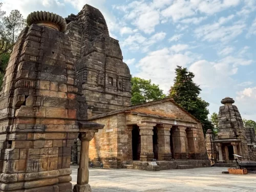Ancient stone structures of Katarmal Sun Temple in Almora, Uttarakhand set against the hills, a historic architectural marvel included in Uttarakhand tour packages