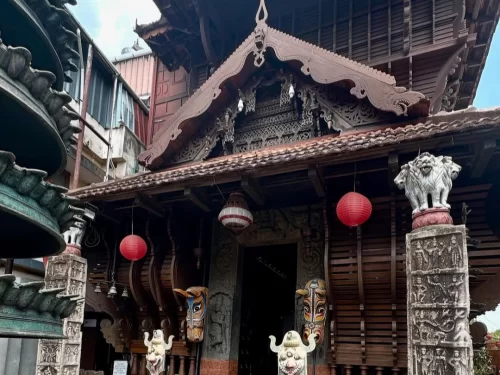 Kerala Folklore Museum, Kochi traditional wooden architecture with intricate carvings and cultural artifacts