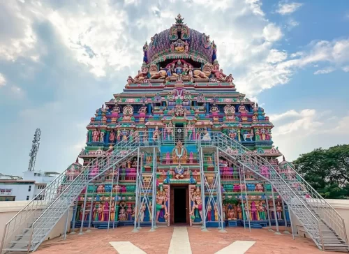 Koodal Azhagar Temple in Madurai featuring the colorful multi-tiered gopuram, intricate sculptures, and three levels of Vishnu shrines.