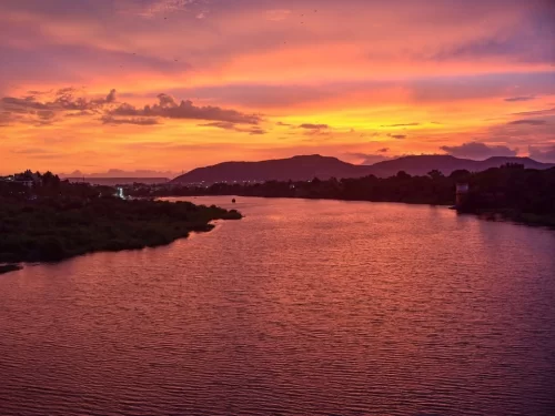 Krishna Riverfront Vijayawada beautiful sunset view over the river in Andhra Pradesh tour packages. 