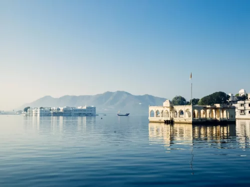 Lake Pichola Udaipur Iconic artificial freshwater lake featuring the floating Taj Lake Palace and Jag Mandir Rajasthan.