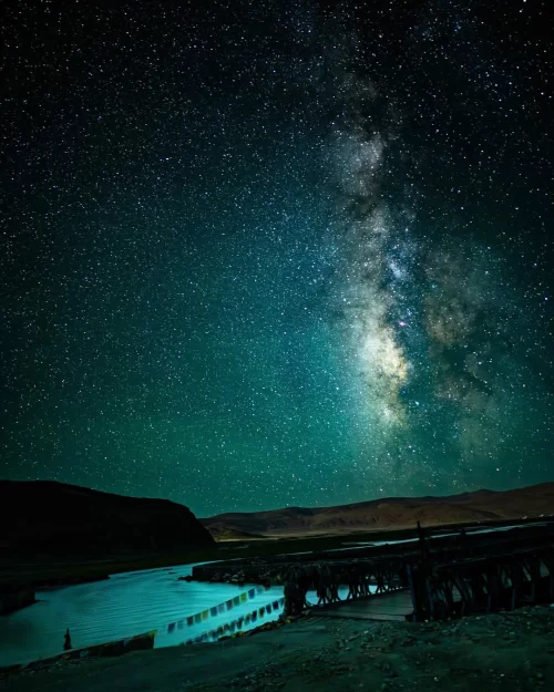 Milky Way galaxy over Hanle Ladakh with river and night landscape, a breathtaking stargazing highlight in Ladakh tour packages