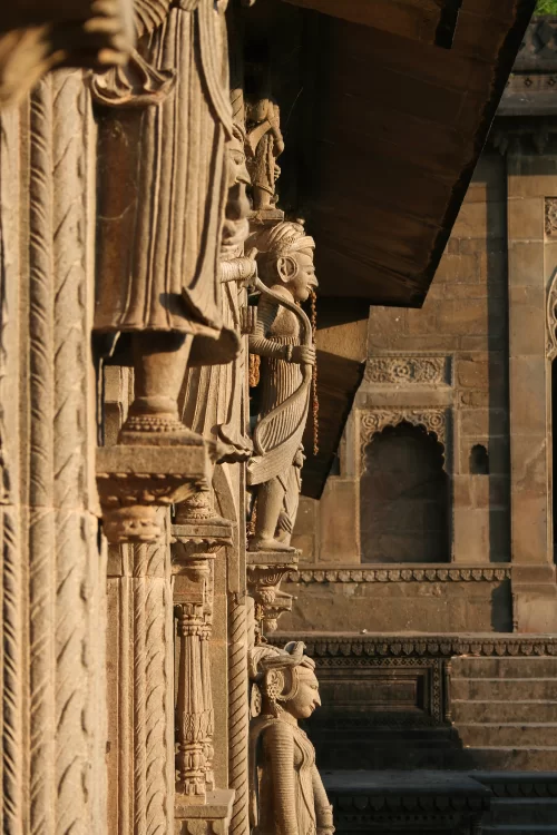 Maheshwar intricate temple carvings and historic architecture on Narmada river banks in Madhya Pradesh tour packages