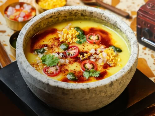 Taj Mahal at Agra during sunset, featuring water reflections, perfect romantic experience Uttar Pradesh tour package.