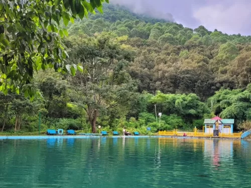 Nal Damyanti Tal Nainital serene mythological lake surrounded by lush hills and tranquil forest scenery