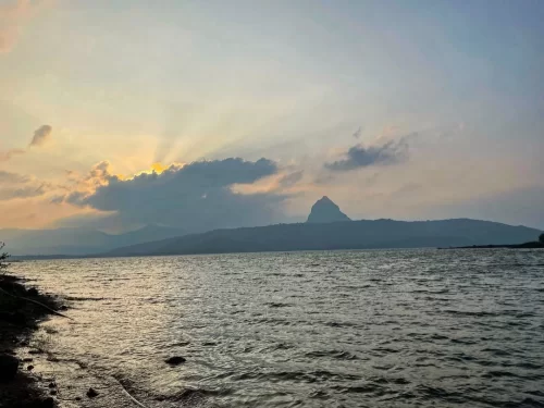 Pawna Lake Lonavala. Scenic lakeside destination with sunset views and lush Sahyadri hills backdrop. 
