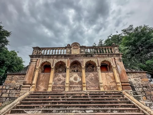 Rani Mahal Jhansi historic palace with arched facade and ornate carvings, heritage monument Uttar Pradesh