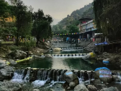Sahastradhara Dehradun scenic sulfur springs with cascading waterfalls and tranquil Himalayan valley views