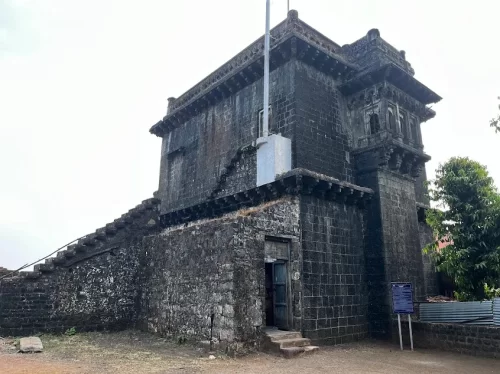 Sajja Kothi Kolhapur historic watchtower and Maratha era monument in Maharashtra tour packages 