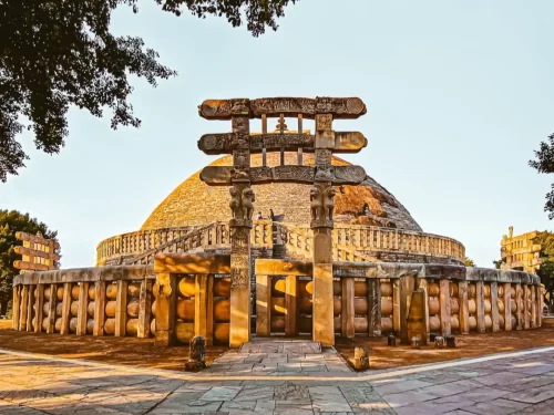 Sanchi Stupa in Sanchi, Madhya Pradesh with carved stone torana gateway and ancient Buddhist dome, featured in Madhya Pradesh tour packages