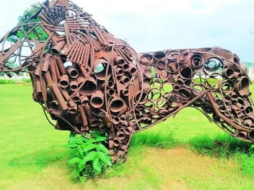 Sarita Udhyan Gandhinagar, scenic riverside garden and popular tourist park with artistic sculptures and lush greenery in India.