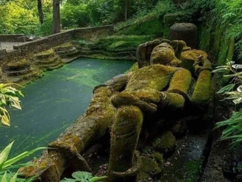 Shesh Shaiya Vishnu Idol in Pachmarhi with reclining Lord Vishnu statue near sacred water tank, Madhya Pradesh pilgrimage site