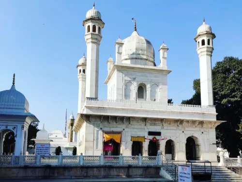 Shree Guru Ram Rai Darbar Sahib in Dehradun, Uttarakhand showcasing its white Mughal-style architecture and domed towers, a historic site included in Uttarakhand tour packages