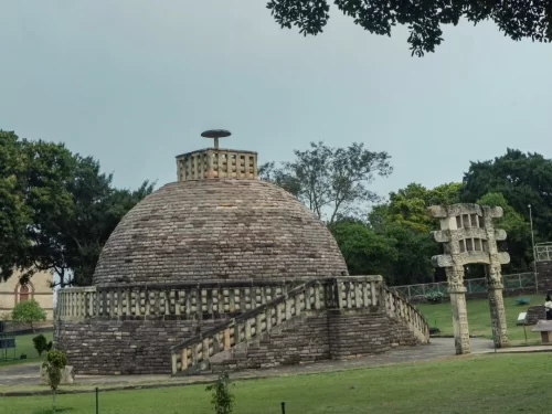 Stupa No. 3 at Sanchi in Madhya Pradesh with stone dome, staircase and carved torana gateway, included in Madhya Pradesh tour packages