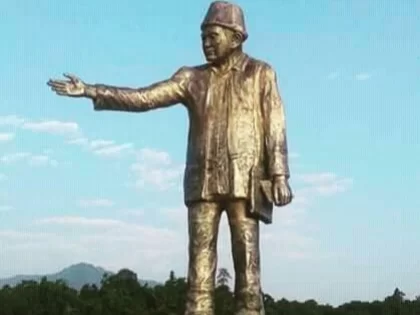 Talom Rukbo Memorial Statue towering tribute honoring a revered leader against a scenic backdrop in Arunachal Pradesh Tour Package.
