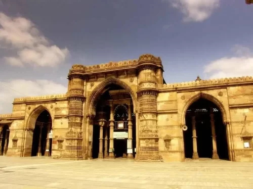 Teen Darwaja, historic triple-arched gateway in Ahmedabad built in the 15th century, showcasing magnificent Indo-Islamic architecture.