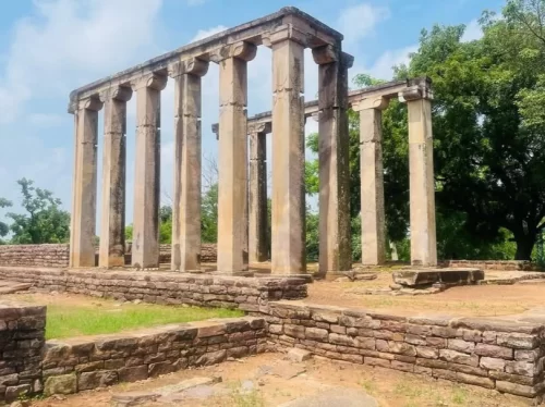 Temple 18 at Sanchi in Madhya Pradesh featuring ancient stone pillars and early Buddhist architectural remains, included in Madhya Pradesh tour packages